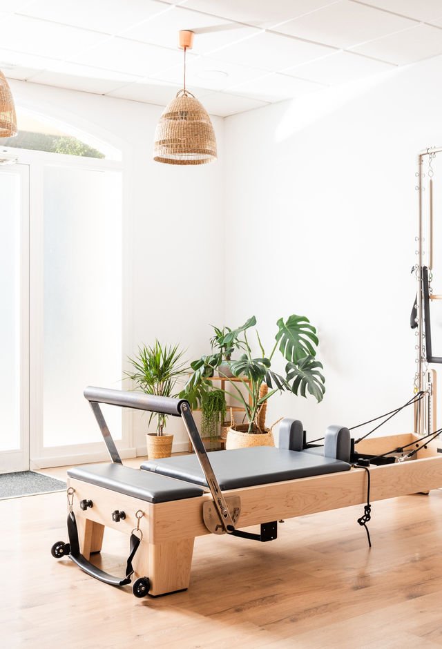 Reformer and Cadillac equipment in the studio